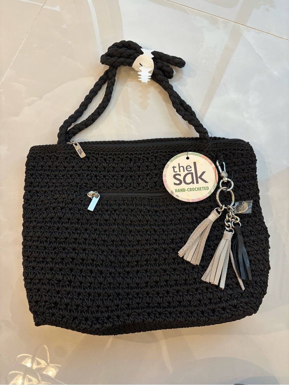 NWT The Sak Hand-Crocheted Black Bag W Tassel Charm